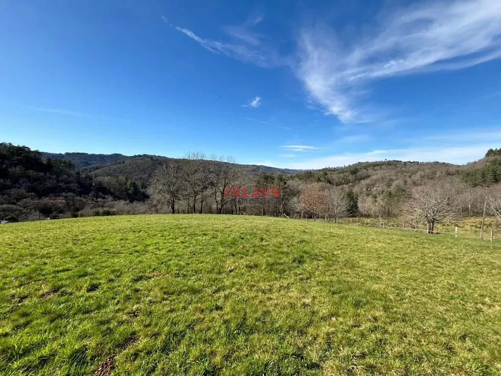 BEAU TERRAIN CONSTRUCTIBLE AVEC VUE