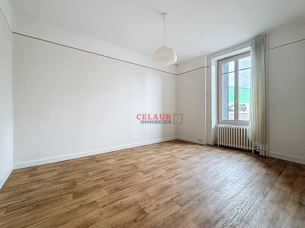 Maison mitoyenne en plein centre